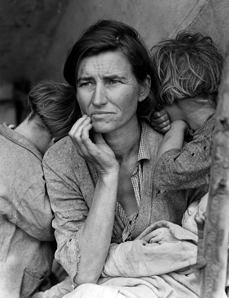 The anguish etched on the face of a mother amidst the Great Depression, surrounded by her children, reflecting the hardships of their era.