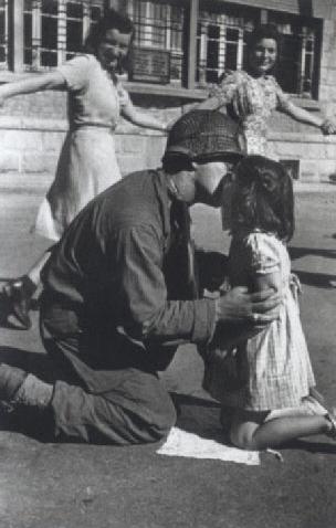 Experience the profound moment of "The Kiss of Liberation" captured by Tony Vaccaro, epitomizing joy, relief, and the end of strife in post-war Europe.